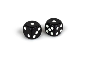 Two black dice isolated on a white background. One and one
