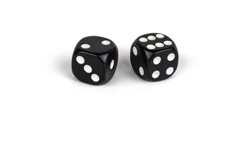 Two black dice isolated on a white background. Two and six