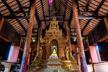 Buddha statue Inside Sanctuary of Wat Phra Sing Ancient Temple of Chiangmai, Thailand
