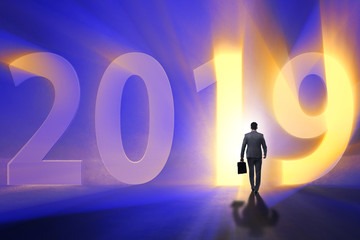 Fototapeta premium Businessman in the concept of transition to year 2019