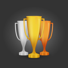 Cartoon award winner cups. Golden, silver and bronze trophy set. Vector illustration.