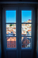 Traditional red house roofs of the Lisbon Portugal outdoor background, top side historic scenic cityscape view.