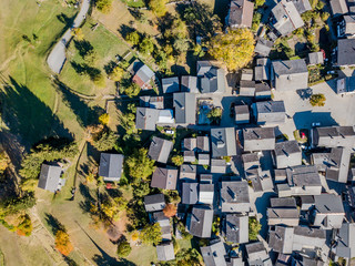 Aerial view of tiny houses in rural village in Swiss mountains in Canton of valais