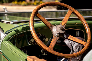 steering wheel of an old car - Powered by Adobe