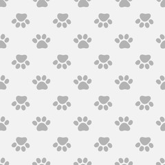 Fototapeta na wymiar Seamless pattern with paws footprints. Pets footprints.