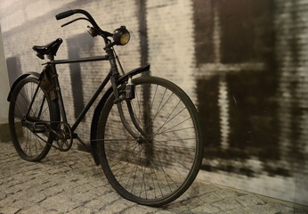 Fototapeta na wymiar Closeup retro style bike with grey blurred background