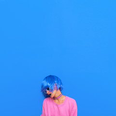 Fashion Girl with blue hair and bright stylish trends outfit. Colorful  vibes