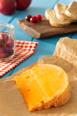 Mimolette,  type of cheese together with the addition of bread and fresh cranberries