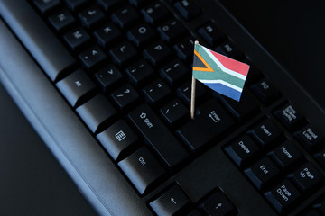 Fototapeta premium South Africa online business concept image consisting of a flag and keyboard. 