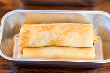 Sweet pancakes with stuffing served as airplane food