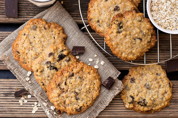 Oatmeal cookies with chocolate served with milk