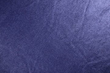 Crumpled fabric blue texture.