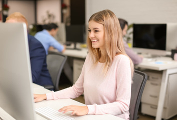 Young woman working in modern office