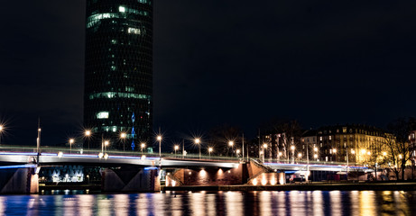 Fototapeta na wymiar Bridge at night in Frankfurt am Main, Germany