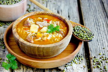 Meat soup with rice and mung beans, traditional uzbek dish Mashhuda
