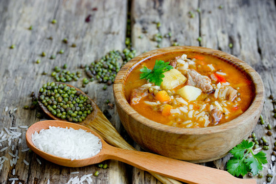 Meat soup with rice and mung beans, traditional uzbek dish Mashhuda
