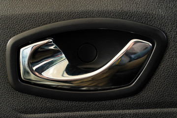 Modern grey chrome car door handle close