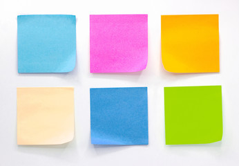 Collection of different colored sheets of note papers Isolated on white background,post it notes