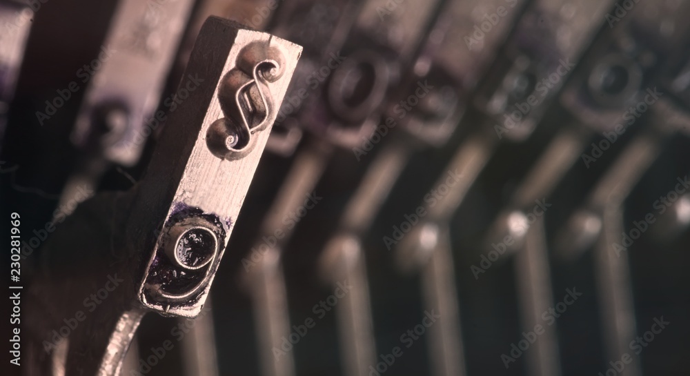 Fototapete section sign from an old typewriter - panoramic picture with copy space.