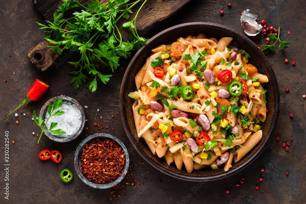 Sticker spicy pasta penne bolognese with vegetables, beans, chili and cheese in tomato sauce