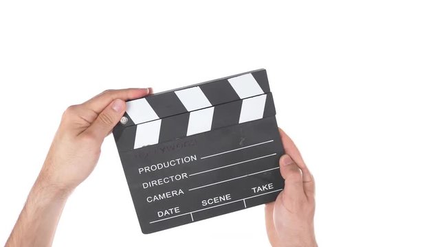 A movie clapper board being used. Pure white background