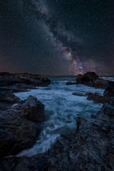 Fototapeta na wymiar Vibrant Milky Way composite image over landscape of Cornwall coastline in England