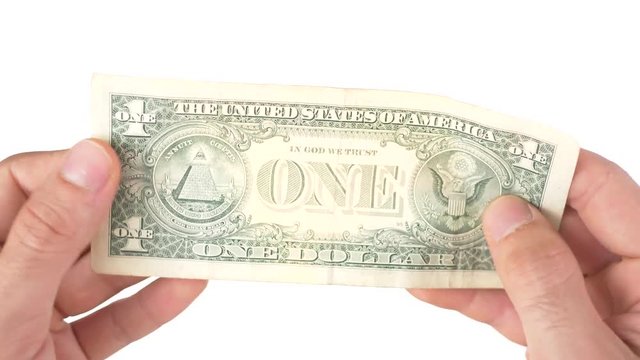 Hands holding an American dollar bill in hands with a white background