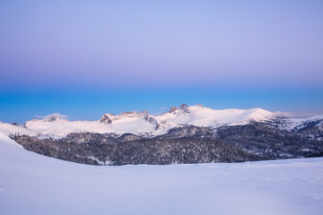 Fototapeta na wymiar Winter landscape during sunset in the mountains in Ergaki national Park.