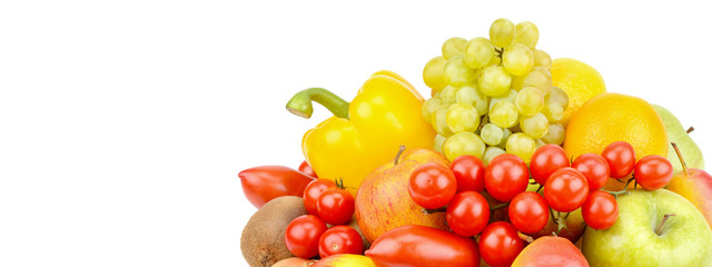 A set of fruits and vegetables isolated on white background. Free space for text. Wide photo .