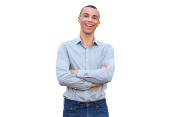 handsome young man smiling with arms crossed against isolated white background