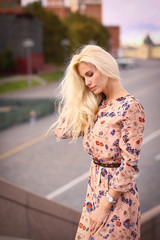 Fototapeta premium blond fashion model russian girl close up photo on red square background
