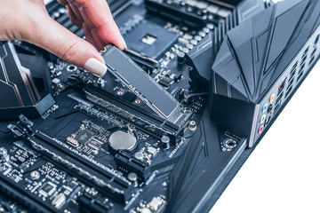Hard disk SSD m2 on the motherboard background.