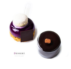 Stylish fashionable new French dessert on isolated white background. View from above. Concept copy for text. Purple cake. Chocolate dessert covered with chocolate icing. 