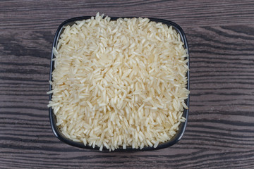 indian basmati rice isolated on texture background.