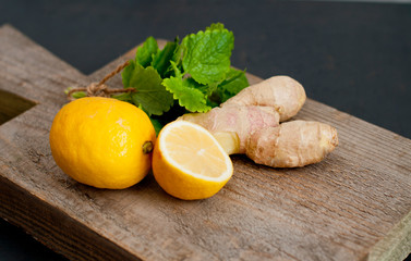 Lemon and ginger with mint, ingredients for a hot drink, tea or herbal infusion.
