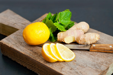 Lemon and ginger with mint, ingredients for a hot drink, tea or herbal infusion.