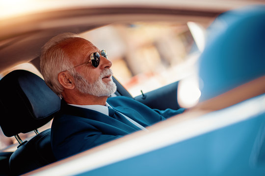 Senior Man Driving Car