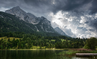 Ferchensee lake in Alps. Thunder clouds