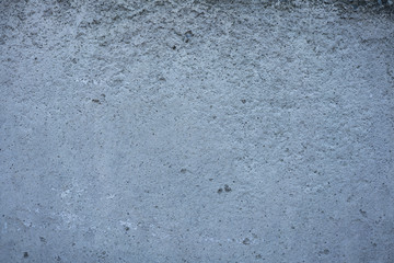 Background - the fragment of a concrete wall.