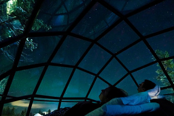 CLOSE UP: Young boyfriend and girlfriend enjoying a romantic evening under stars