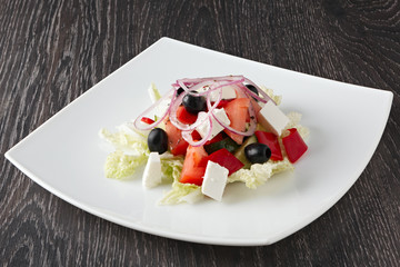 Fruit and vegetable salad with meat. Side view.