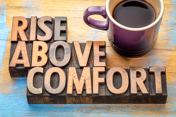 rise above comfort - word abstract in wood type