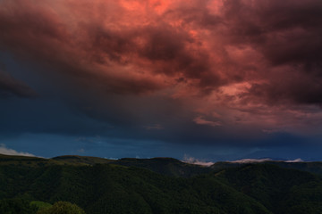 The sky at sunset over the hills in the foothills of the North Caucasus in Russia.