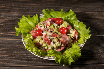 Tasty salad with raw vegetables