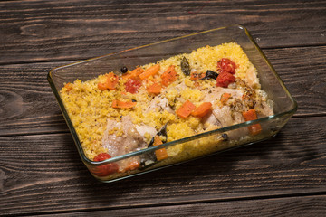 Millet porridge with chicken and vegetables in glass form