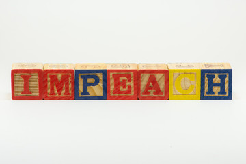 IMPEACH in Alphabet Block Letters