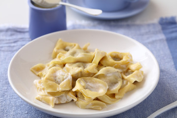 Ravioli under cream sauce
