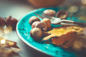 Thanksgiving. Holiday dinner table served, decorated with bright autumn leaves