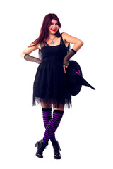 Photo of witch in black dress and hat