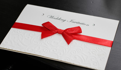 blank card with red bow